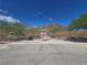 View of the park entrance with a trail and parking lot at 853 Rusty Anchor Way, Henderson, NV 89002