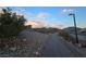 Scenic walking path through community, featuring desert landscaping and peaceful surroundings at 853 Rusty Anchor Way, Henderson, NV 89002