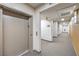 Hallway view with elevator and common area hallway leading to the condos at 8777 W Maule Ave # 3102, Las Vegas, NV 89148