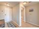 Neutral foyer with ceramic tile flooring leading to bathroom and other rooms at 8777 W Maule Ave # 3102, Las Vegas, NV 89148