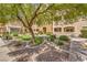 Well-maintained condo grounds with mature shade tree, shrubs, ground cover and lush landscaping at 8777 W Maule Ave # 3102, Las Vegas, NV 89148