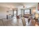 Open-concept space with dining area, living room featuring a comfortable sofa at 8777 W Maule Ave # 3102, Las Vegas, NV 89148