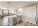 Open-concept living space featuring kitchen island and spacious living room at 8777 W Maule Ave # 3102, Las Vegas, NV 89148