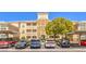 View of condo parking lot with covered parking spots and well-maintained landscaped grounds at 8777 W Maule Ave # 3102, Las Vegas, NV 89148