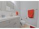 Bathroom with a large mirror, white subway tile backsplash, and soft-close vanity drawers at 9121 Ripple Ridge Ave # 101, Las Vegas, NV 89149
