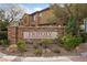 Beautiful sign at Tripoli at Town Center community with mature trees and well-maintained landscaping at 9121 Ripple Ridge Ave # 101, Las Vegas, NV 89149