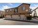 Inviting townhome featuring attached garages and exterior with neutral color palette at 9121 Ripple Ridge Ave # 101, Las Vegas, NV 89149