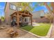 Beautiful backyard featuring a covered patio and low-maintenance landscaping at 9144 Irish Elk Ave, Las Vegas, NV 89149