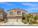 Charming two-story home with a two car garage and well manicured landscaping at 9144 Irish Elk Ave, Las Vegas, NV 89149