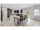 Bright kitchen with dark cabinets and stainless steel appliances at 9144 Irish Elk Ave, Las Vegas, NV 89149