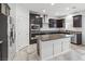 Modern kitchen with granite countertops, stainless steel appliances, and a spacious island at 9144 Irish Elk Ave, Las Vegas, NV 89149