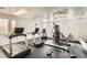 On-site gym with modern treadmills, weight machines, and ceiling fans for convenient workouts at 950 Seven Hills Dr # 424, Henderson, NV 89052
