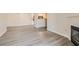 Open floor plan with modern flooring, connecting the living area and kitchen space at 950 Seven Hills Dr # 424, Henderson, NV 89052