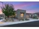 Charming modern home with well-maintained landscaping and a two-car garage at 9889 Gemstone Sunset Ave, Las Vegas, NV 89148