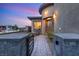Inviting front entrance with a gated walkway and stone accents at 9889 Gemstone Sunset Ave, Las Vegas, NV 89148