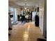 Bright dining room with tiled flooring and a mirrored accent wall at , Las Vegas, NV 89102