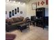 Comfortable living room with tile floors, neutral paint and modern decor at , Las Vegas, NV 89102
