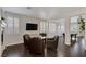 Stylish living room featuring a fireplace, shuttered windows, and comfortable seating area at 10004 W Cherokee Ave, Las Vegas, NV 89147