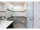 Contemporary bathroom with a tiled glass shower with a built in seat at 10356 Addie De Mar Ln, Las Vegas, NV 89135