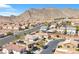 Community view showcasing residential neighborhood, mountain backdrop, and tree-lined streets at 10365 Cherokee Corner Ave, Las Vegas, NV 89129