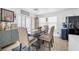 Charming dining area featuring a table with seating for six and stylish decor at 10365 Cherokee Corner Ave, Las Vegas, NV 89129