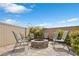 Backyard fire pit area with seating, perfect for outdoor gatherings and enjoying the evenings at 10365 Cherokee Corner Ave, Las Vegas, NV 89129