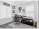 This office features neutral walls and carpet, a ceiling fan, and a computer desk at 10365 Cherokee Corner Ave, Las Vegas, NV 89129