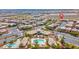 An aerial view highlights the property's proximity to community amenities like a pool and clubhouse at 10529 Mount Blackburn Ave, Las Vegas, NV 89166