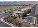 A beautiful two-story home with a well-manicured yard in a suburban neighborhood at 10529 Mount Blackburn Ave, Las Vegas, NV 89166