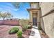 Inviting front entrance featuring a stylish front door and desert landscaping at 10529 Mount Blackburn Ave, Las Vegas, NV 89166