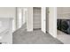 Upstairs hallway with carpeting leading to the laundry room and closet at 10529 Mount Blackburn Ave, Las Vegas, NV 89166
