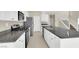 Stylish kitchen with granite countertops, stainless steel appliances, and white cabinets at 10529 Mount Blackburn Ave, Las Vegas, NV 89166