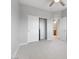 Neutral bedroom featuring a ceiling fan, closet, and access to the en suite bathroom at 11408 Newton Commons Dr # 104, Las Vegas, NV 89135