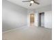 Bright bedroom with ceiling fan, neutral walls, carpeted floor, and closet at 11408 Newton Commons Dr # 104, Las Vegas, NV 89135