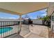 Spacious backyard patio with a pool, shed, and covered area, perfect for entertaining at , Las Vegas, NV 89145
