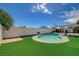 Picture of backyard pool with landscaped yard and shade covering perfect for relaxation at , Las Vegas, NV 89145