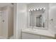 Bright bathroom with a shower and a vanity featuring a modern sink at , Las Vegas, NV 89145