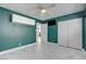 Bedroom features marble-look floors, teal walls, ceiling fan, and closet at , Las Vegas, NV 89145