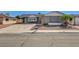 Charming front exterior with mature palm trees and a spacious driveway at , Las Vegas, NV 89145