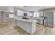 Modern kitchen with white cabinets, stainless steel appliances, and quartz countertops at , Las Vegas, NV 89145