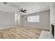 Inviting living room boasts ample natural light, neutral paint, and updated wood flooring at , Las Vegas, NV 89145