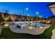 Beautifully landscaped backyard featuring a pool, spa, and play area, ideal for Gathering fun and relaxation at 12199 Canyon Sunset St, Las Vegas, NV 89138
