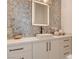 Elegant powder room with decorative tile accent wall, modern vanity, and stylish faucet at 12199 Canyon Sunset St, Las Vegas, NV 89138