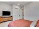 Comfortable bedroom with a tv console and closet at 12199 Canyon Sunset St, Las Vegas, NV 89138