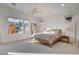 Bright bedroom with large window overlooking backyard play structure, neutral palette and natural light at 12199 Canyon Sunset St, Las Vegas, NV 89138
