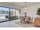 Cozy dining room with sliding glass doors to the backyard, providing ample natural light and indoor/outdoor flow at 12199 Canyon Sunset St, Las Vegas, NV 89138