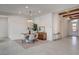 Open dining area with stylish furnishings, a modern chandelier, and easy access to the home's entry at 12199 Canyon Sunset St, Las Vegas, NV 89138
