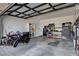 Spacious garage featuring a modern ceiling, storage shelves, and ample room for parking and hobbies at 12199 Canyon Sunset St, Las Vegas, NV 89138