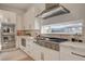 Modern kitchen featuring stainless steel oven and cooktop at 12199 Canyon Sunset St, Las Vegas, NV 89138