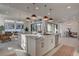 Bright living area featuring an island, dining area, and living room at 12199 Canyon Sunset St, Las Vegas, NV 89138
